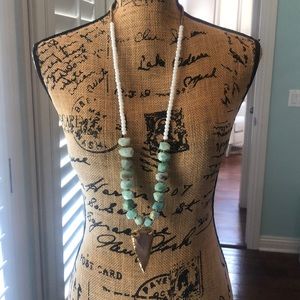 Long necklace with arrowhead